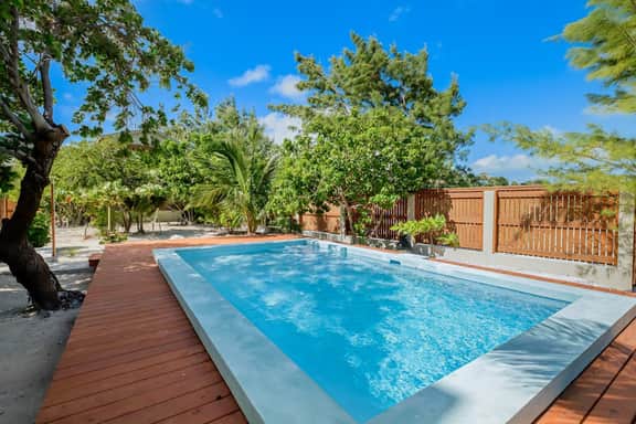 Tropical retreat villa with a pool, dock, bikes, canoes, balconies, and 360 views - Image 4