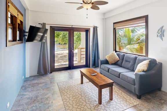Beachfront suite with reef views - pool, bikes, canoes, dock, and grill access - Image 2