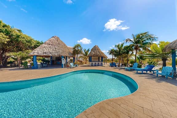 Charming Apartment with Idyllic Waterfront Views and Outdoor Pool Access - Image 3