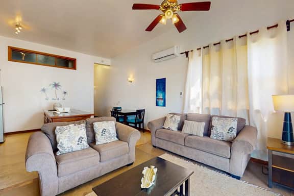 Charming Apartment with Idyllic Waterfront Views and Outdoor Pool Access - Image 4