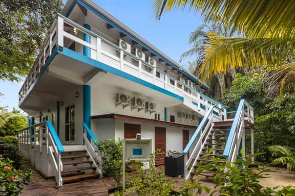 Tranquil ocean-view escape with shared pool, beach access, AC, & free wifi - Image 4