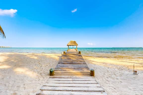 Romantic beachfront home with ocean views, dock, free WiFi, and outdoor dining - Image 2