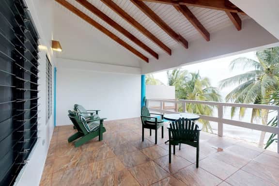 Beachfront, ocean-view getaway with shared pool, hammock, WiFi, & central AC - Image 4