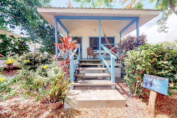 Cabana with a porch, hammock, & view of the pool & grilling area - Image 4