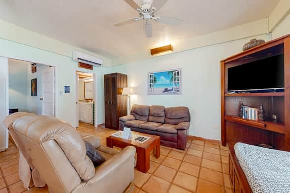 Colorful oceanfront condo with shared pool, WiFi, ocean view, and central AC - Image 5