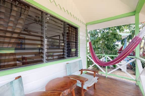 Wood cabana with a porch, pool view, WiFi, and a shared common area with grills - Image 2