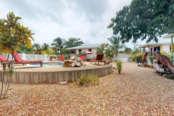 Wood cabana with a porch, pool view, WiFi, and a shared common area with grills - Image 4
