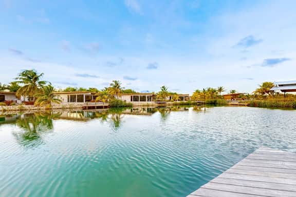 Waterfront villa with private pool, furnished deck & gas grill - Image 4