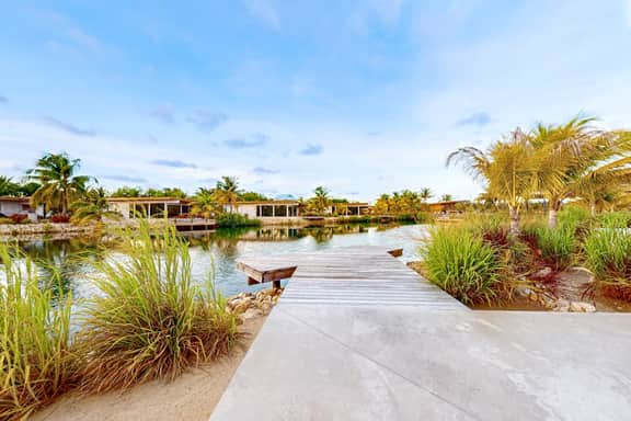 Waterfront villa with private pool, furnished deck & gas grill - Image 3