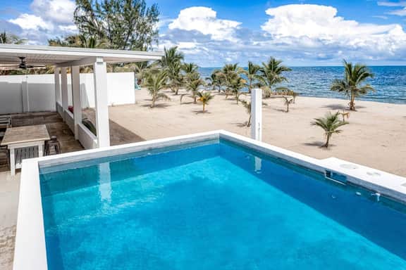 Luxurious beachfront home with private pool, rooftop grill, and sea views - Image 2