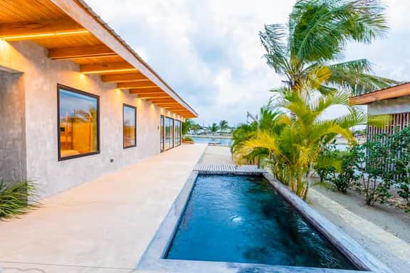 Relaxing tropical villa with private plunge pool, open layout & canal water view - Image 2