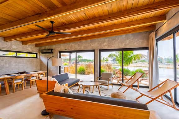 Relaxing tropical villa with private plunge pool, open layout & canal water view - Image 3