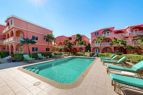 Breezy 2-story oceanfront condo with pool, sea views & partial AC - Image 3