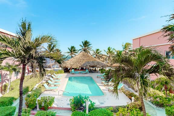 Ocean-view studio with pool, WiFi & partial AC - steps from the beach - Image 3