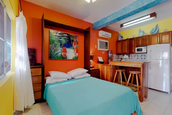 Ocean-view studio with pool, WiFi & partial AC - steps from the beach - Image 5