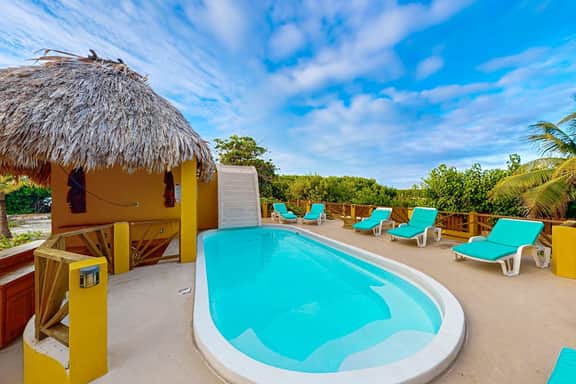 Waterfront villa with private pool, balcony, partial AC, fast WiFi - near beach - Image 3