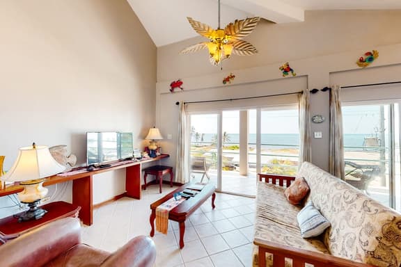 Well-Located Beachfront Apartment with Ocean View, Pool, Central AC, & WiFi - Image 1