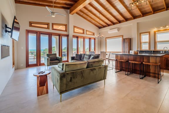 Tropical retreat villa with a pool, dock, bikes, canoes, balconies, and 360 views - Image 1