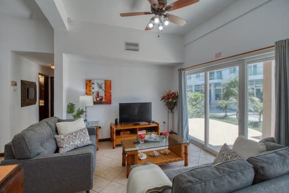 Ground-level condo w WiFi, central AC, & pool - walk to the beach - Image 1