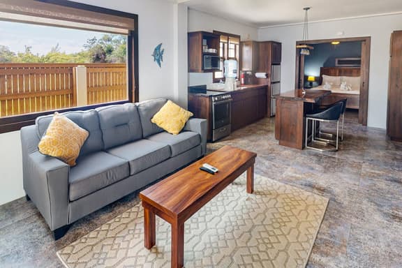 Beachfront suite with reef views - pool, bikes, canoes, dock, and grill access - Image 1