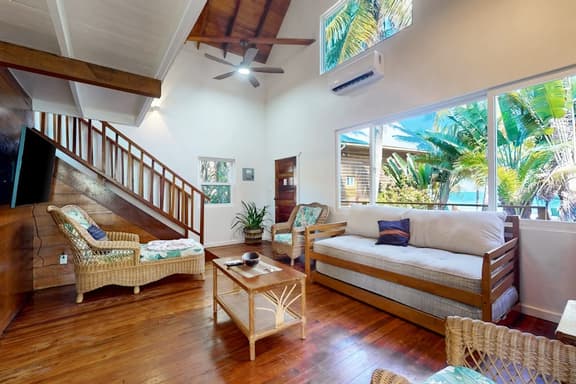 Romantic beachfront home with ocean views, dock, free WiFi, and outdoor dining - Image 1