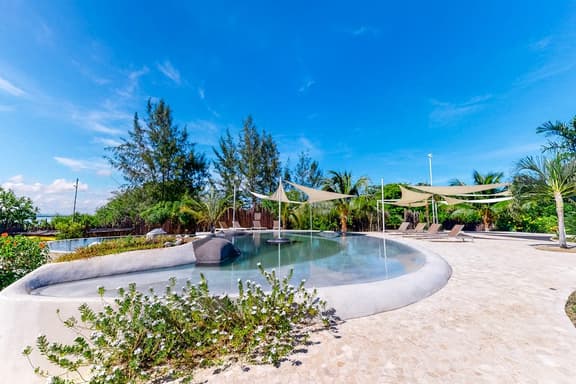 Lagoon view retreat villa with pool, private hot tub, & AC - Image 1