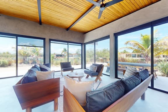 Elegant waterfront villa with private terrace, pool, beach access & 4 en-suites - Image 1