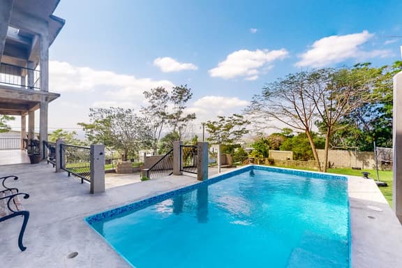 Enchanting home with pool, volleyball, mountain & city views & AC - Image 1