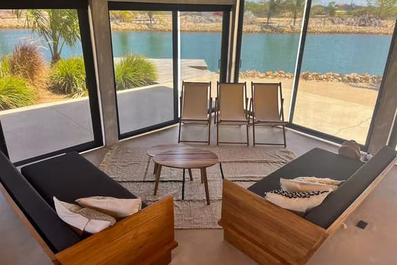 Relaxing tropical villa with private plunge pool, open layout & canal water view - Image 1