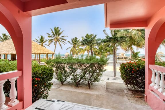 Beachfront dog-friendly condo with pool - walk to ocean from the veranda - Image 1