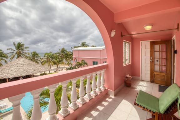 Ocean-view condo with outdoor pool, dock, grill, balcony, beach access - Image 1