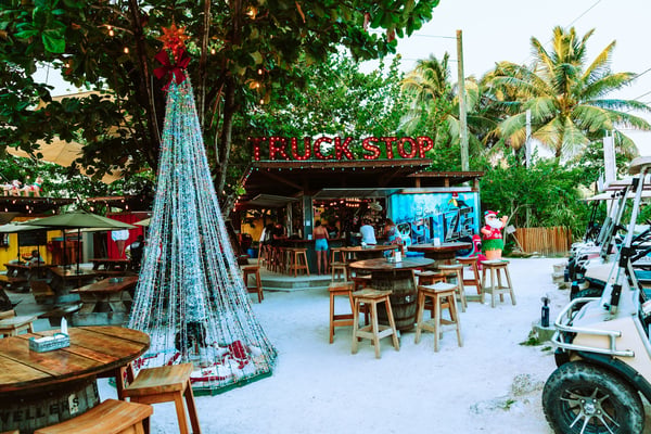 Lively beach bar and outdoor seating in San Pedro town